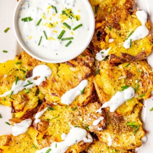 Crispy Smashed Potatoes with Lemony Chive Sauce - Olivia Adriance