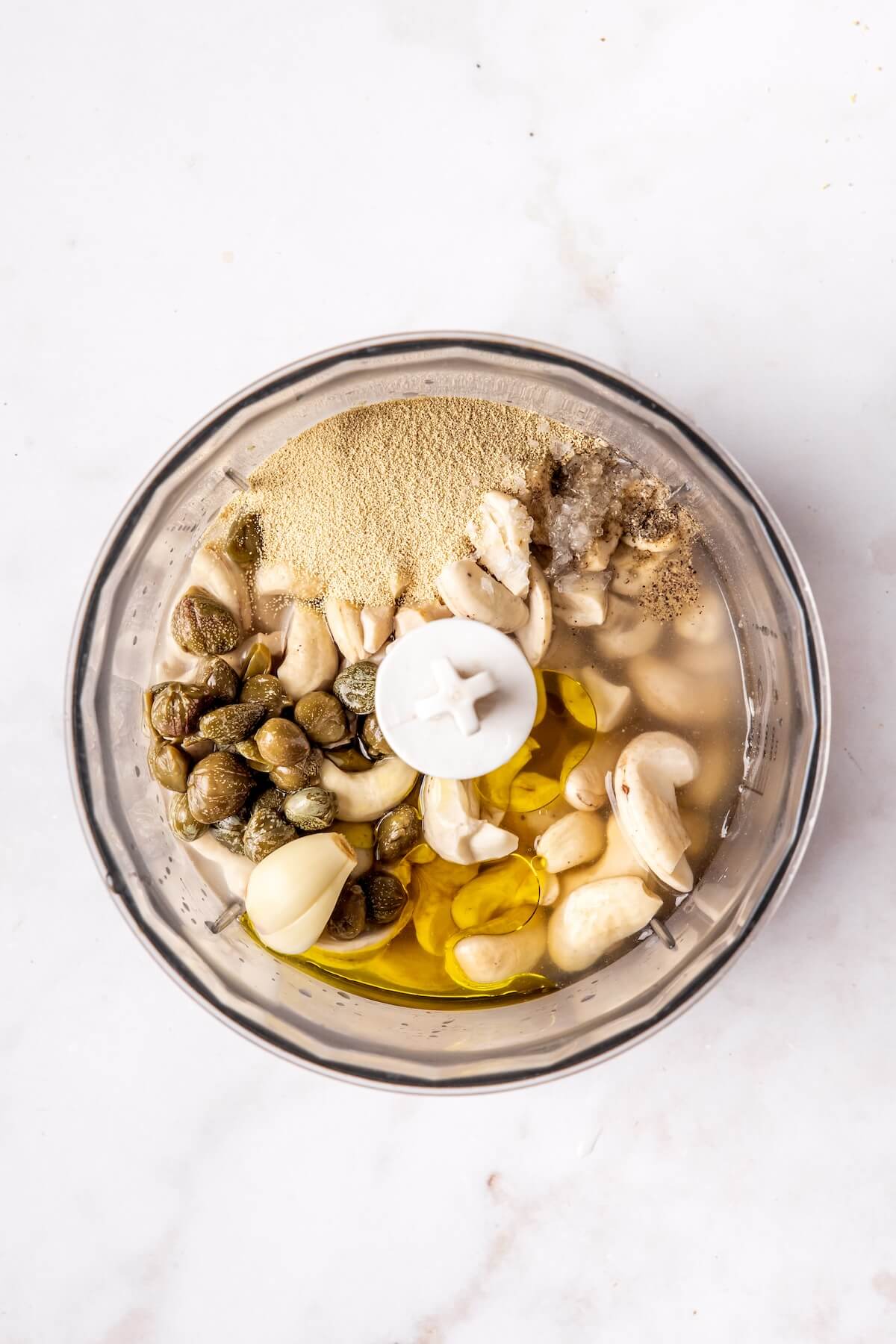 Ingredients Cashew Caesar Salad with Crispy Chicken Step 6 - Olivia Adriance