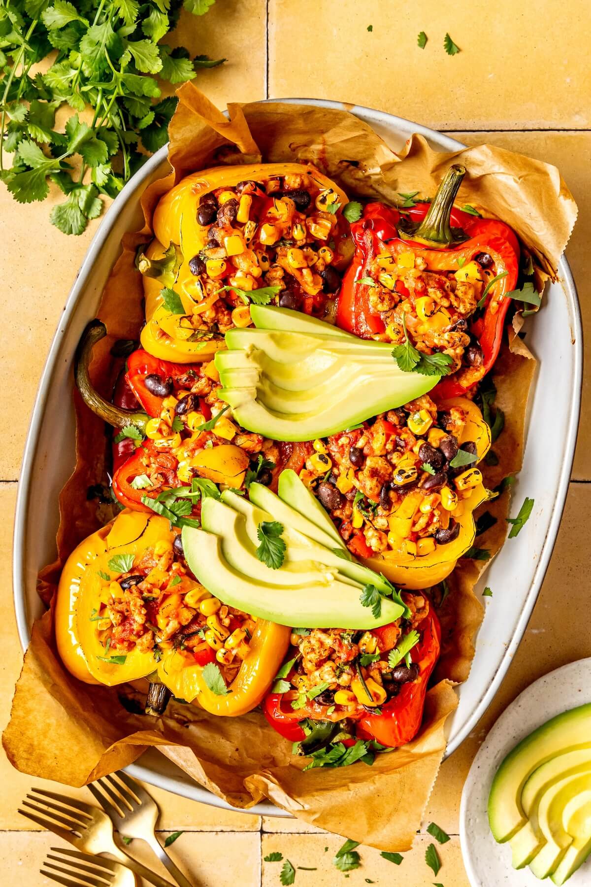 Southwest Stuffed Peppers with Black Beans and Corn - Olivia Adriance
