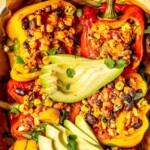 Southwest Stuffed Peppers with Black Beans and Corn - Olivia Adriance