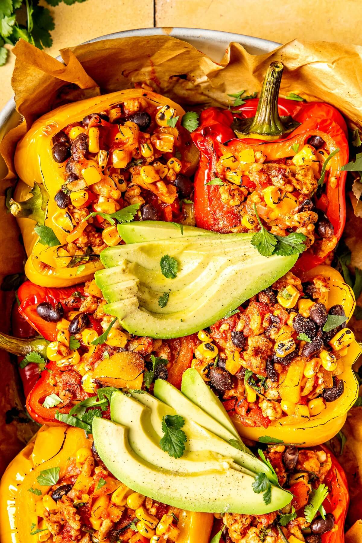 Southwest Stuffed Peppers with Black Beans and Corn - Olivia Adriance