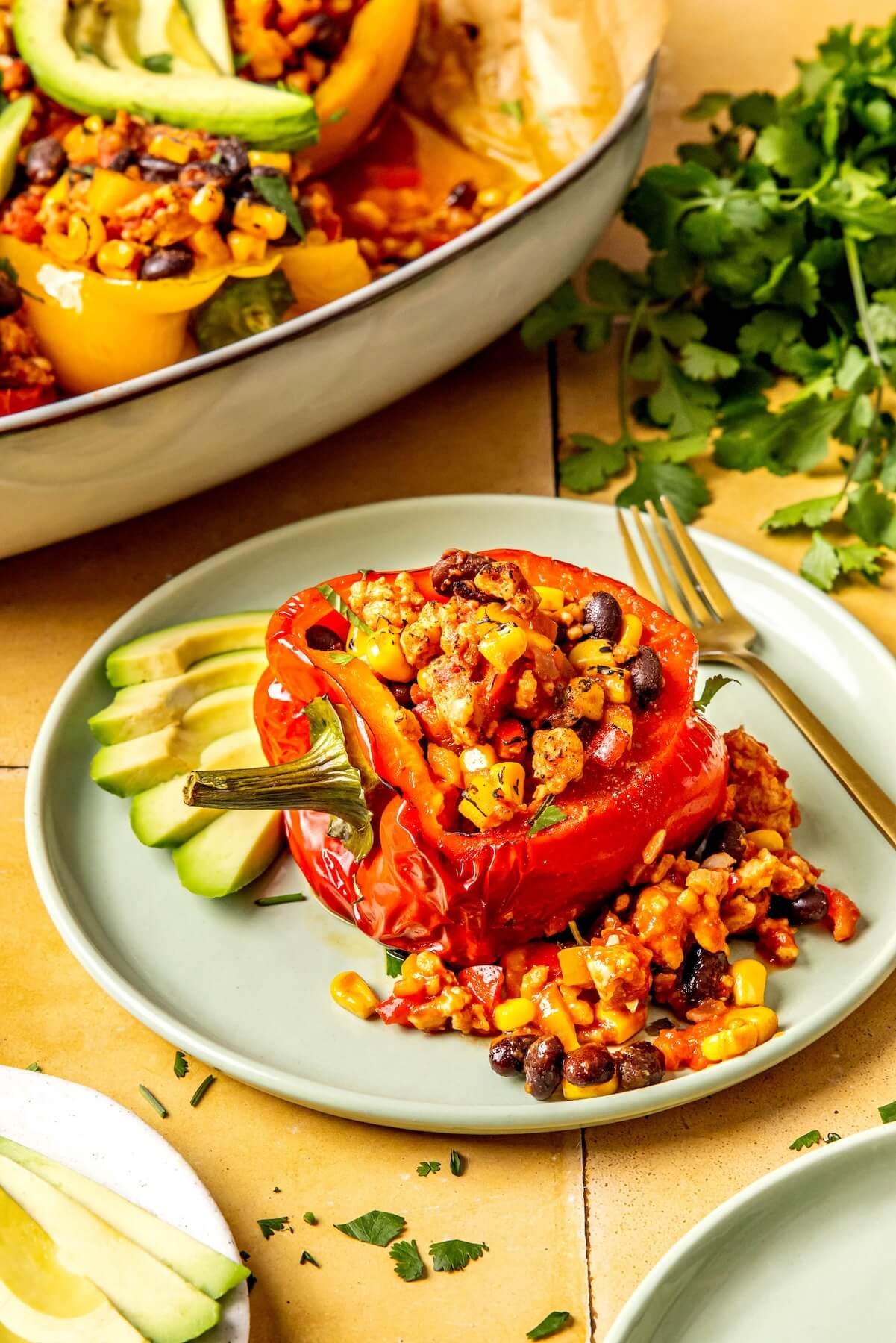 Southwest Stuffed Peppers with Black Beans and Corn - Olivia Adriance