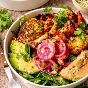 Roasted Veggie Hummus Bowl with Roasted Garlic Sauce - Olivia Adriance