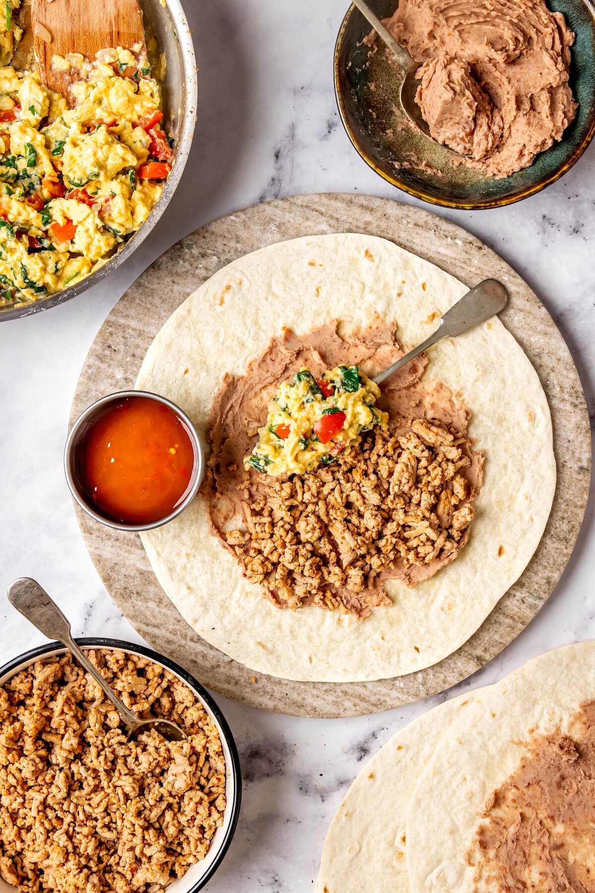 How to Make Freezer Friendly Breakfast Burritos Meal Prep Step 5 - Olivia Adriance