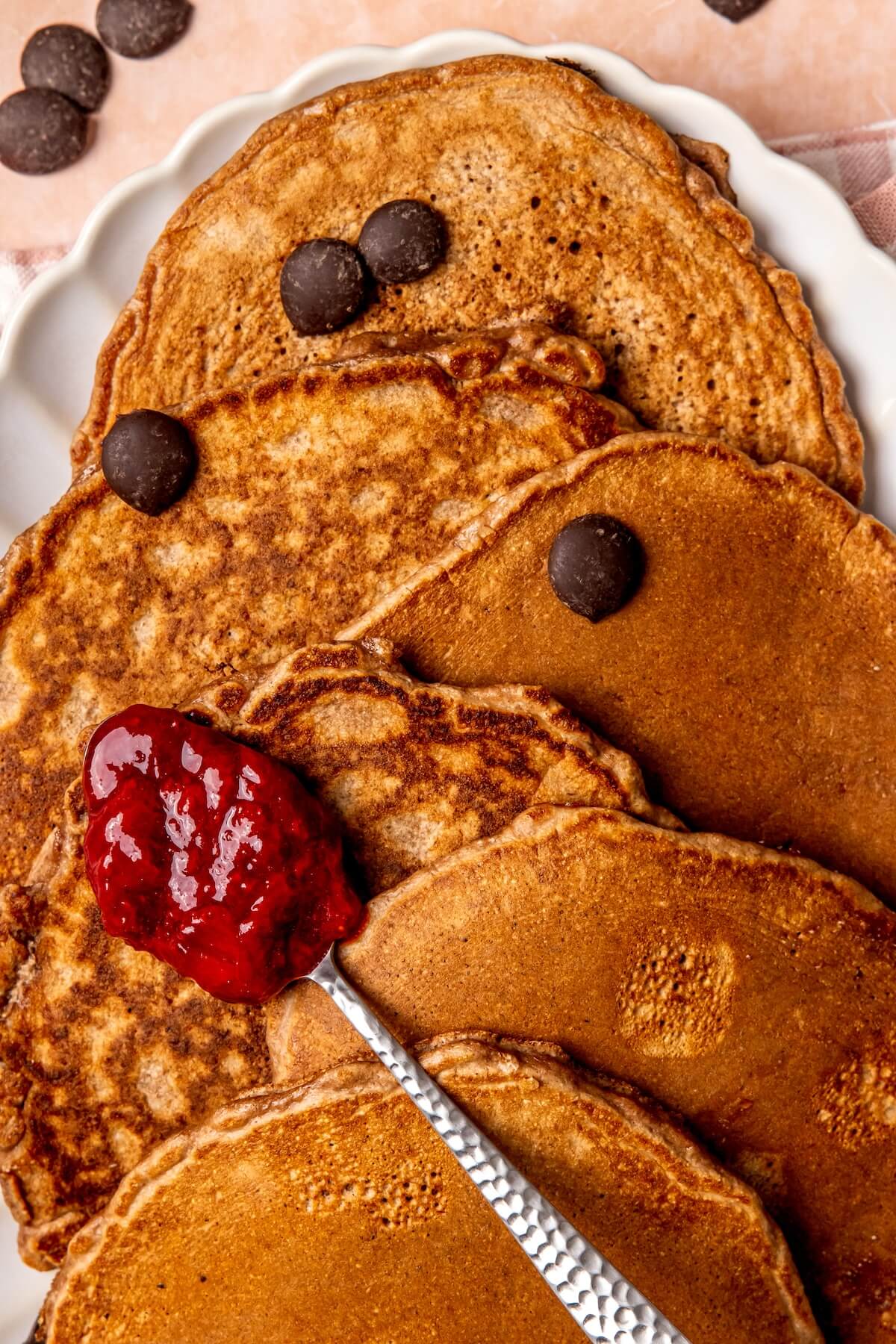 Chocolate Protein Pancakes with Strawberry Sauce - Olivia Adriance